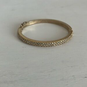 Gold tone costume jewelry bangle